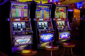 Live dealer at Casino Hold'em table dealing cards